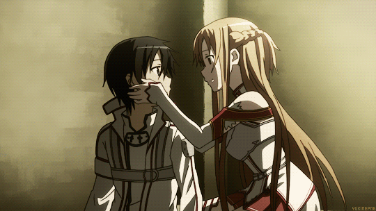 Kirito and Asuna ready to kiss in Sword Art Online.