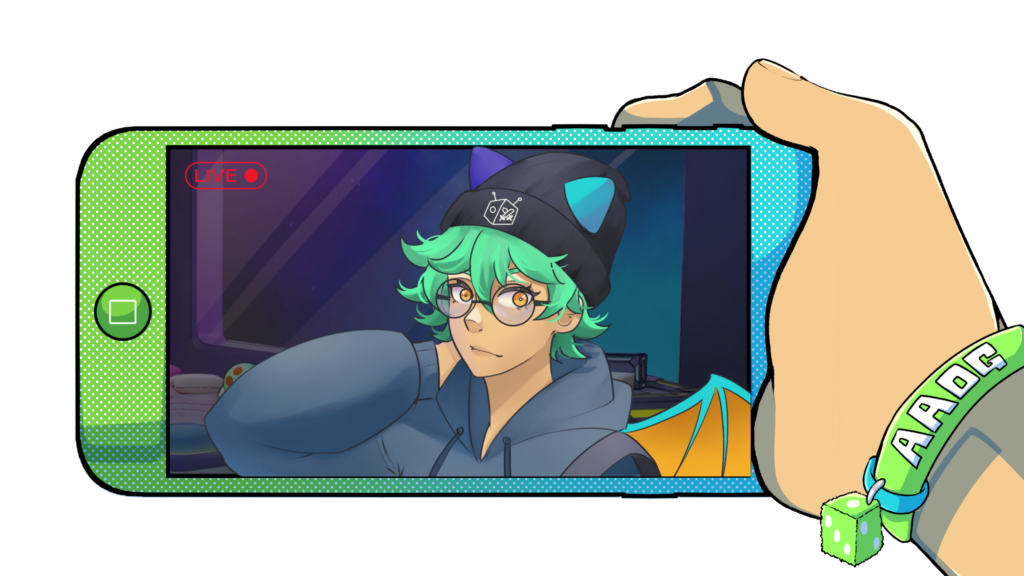 "Illustration of Kasai, a character with green hair, glasses, and dragon horns, wearing a hoodie and a beanie with cat ears. She is live streaming, visible on a smartphone screen held by a hand wearing an 'AAOG' wristband. The 'All Ages of Geek' logo is in the corner."