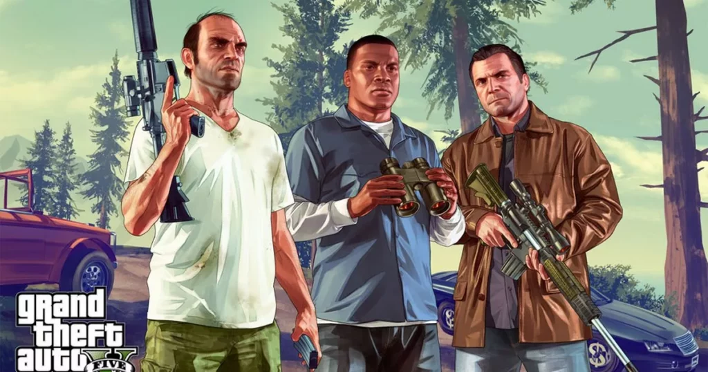 Promotional image from the video game Grand Theft Auto V featuring the three main characters: Trevor, Franklin, and Michael. Trevor, on the left, is holding a large assault rifle and wearing a white t-shirt with a determined expression. Franklin, in the center, is holding binoculars and wearing a blue shirt, looking focused. Michael, on the right, is holding a sniper rifle and wearing a brown jacket, appearing serious. The background shows a forested area with tall trees and vehicles, evoking the rugged environments featured in the game. Used for New Jersey Video Game Ideas Article.