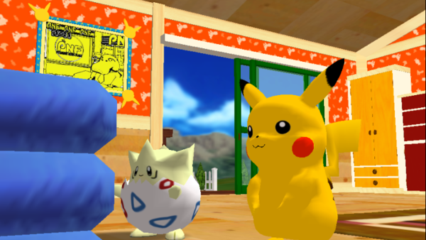 A screenshot from Pokémon Channel featuring Pikachu and Togepi in a brightly colored room. Pikachu stands happily on the wooden floor next to Togepi, who is smiling with its signature egg-shaped shell. The room has orange wallpaper with white patterns, a blue cushion on the left, and a large open window showing a bright blue sky with mountains in the distance. A yellow poster with Pokémon artwork is visible on the wall, adding to the cozy and playful atmosphere of the scene.