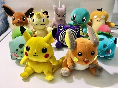 Image of a collection of vintage Pokémon plush toys from the 1990s. The plushies include popular characters like Pikachu, Raichu, Bulbasaur, Squirtle, Eevee, Meowth, Psyduck, Mewtwo, Poliwag, and Ivysaur. The plush toys are arranged in a group, with Pikachu and Raichu in the front. Each plushie has a cute and soft appearance, capturing the iconic features of the Pokémon characters, and evokes a sense of nostalgia for fans of the original Pokémon series.