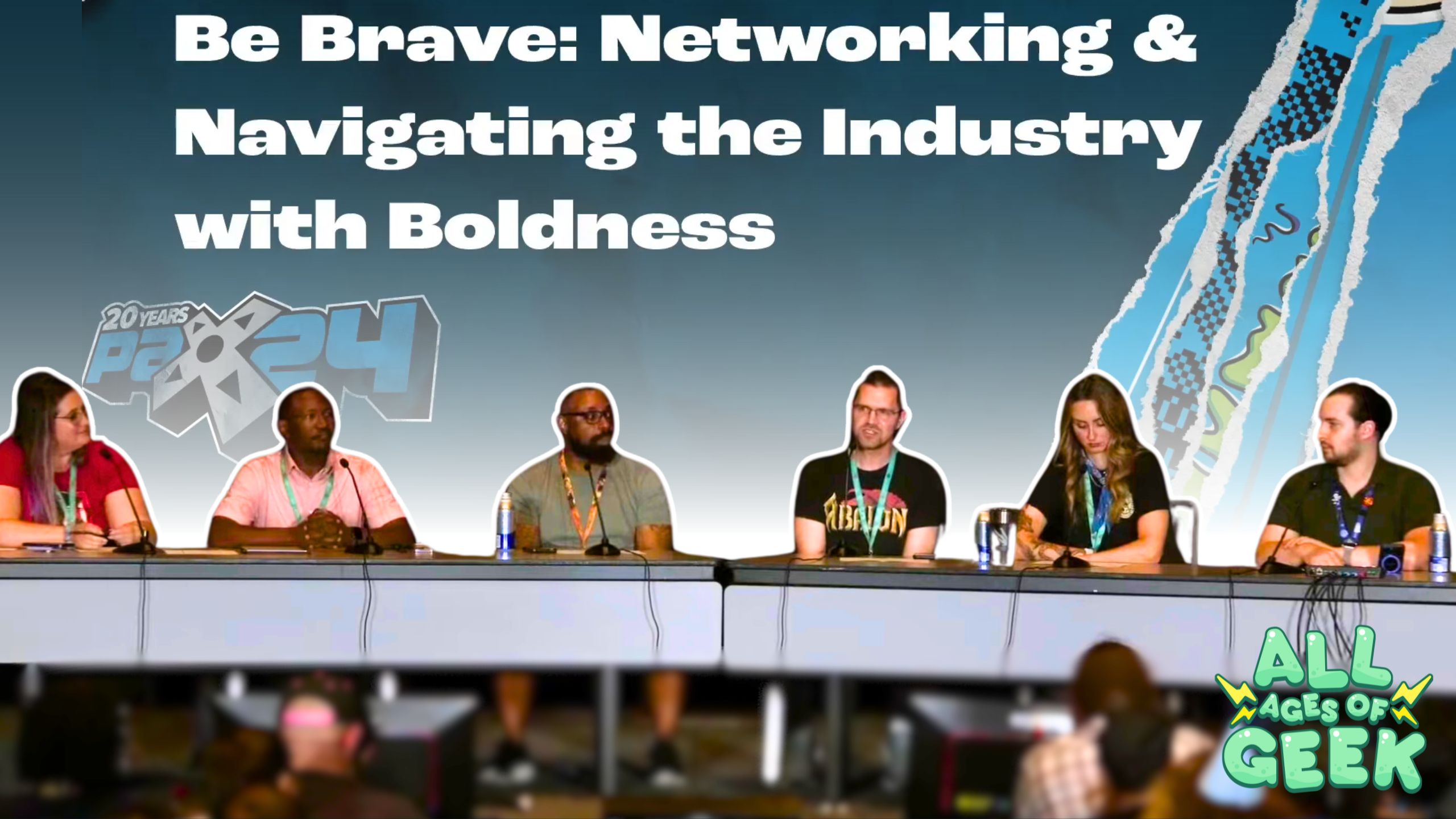 A panel discussion at PAX West 2024 titled "Be Brave: Networking & Navigating the Industry with Boldness." The image shows six panelists seated at a long table, each with a microphone. The backdrop displays the PAX West 2024 logo. The panelists appear to be engaged in conversation, and the atmosphere seems lively and focused. The "All Ages of Geek" logo is visible in the bottom right corner of the image.