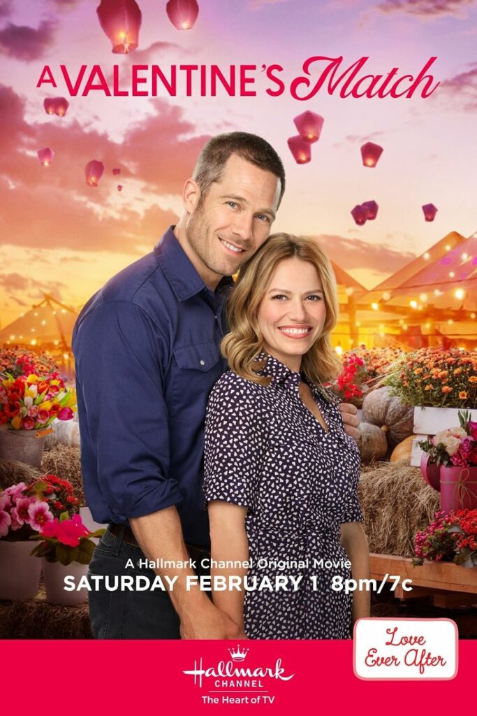 "Bethany Joy Lenz and Luke Macfarlane in a promotional image for Hallmark's Countdown to Summer movie 'A Valentine's Match.'"