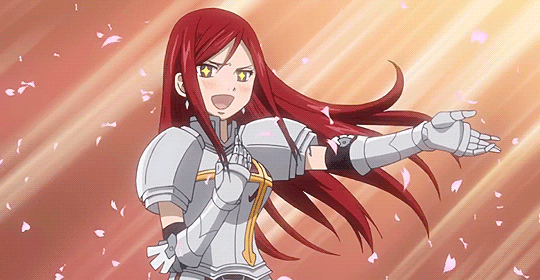 Erza Scarlet from Fairy Tail, smiling and extending her arm in greeting, wearing white and gold armor, with pink petals falling around her.
