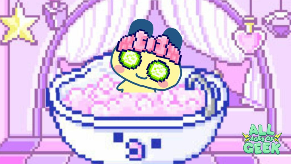 A Tamagotchi character, Mametchi, is taking a bubble bath in a pastel pink bathroom. The room is adorned with cute decorations, including a star and heart-shaped lights. The image has a pixel art style and includes the All Ages of Geek logo in the bottom right corner. The text "TAMAMORI Fashion Show" is associated with this image.