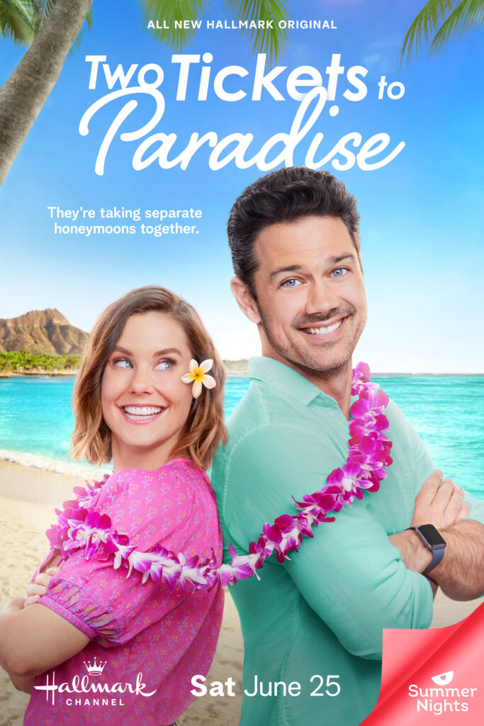 "Ashley Williams and Ryan Paevey in a promotional image for Hallmark's Countdown to Summer movie 'Two Tickets to Paradise.'"

