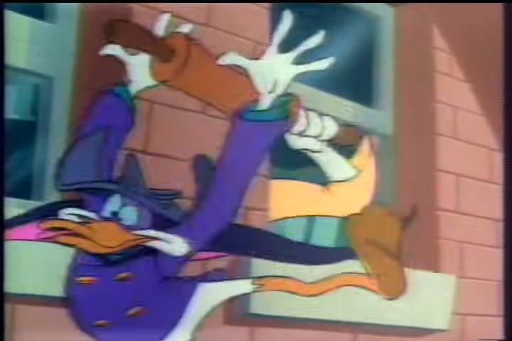 Darkwing Duck getting tossed from a window looking shocked as he dives down the brick building.