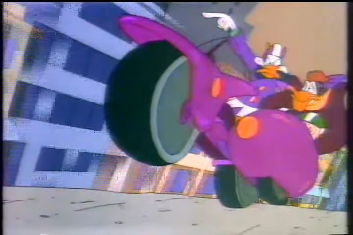 Darkwing Duck on his purple motorcycle riding through the city streets with a very 90s look to it.