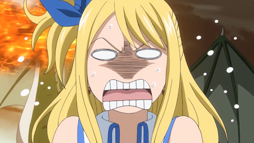 Lucy looks scared and angry with her mouth and teeth open and showing, eyes buggy with dragon wings behind her.