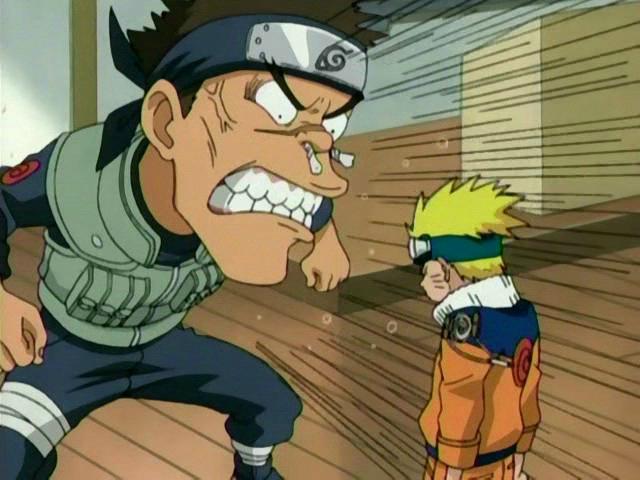 Naruto gets scolded in school by Iruka, shoulders slouched with Iruka clamping his teeth and jaw shut, eyes bugged out.