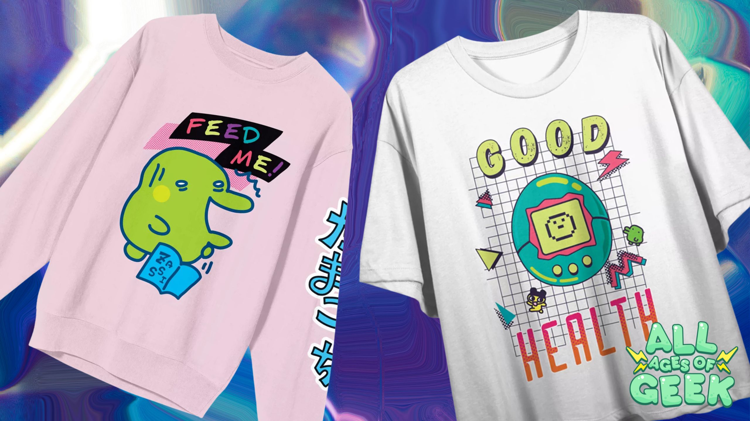 Two Tamagotchi t-shirts from Target. On the left, a pink sweatshirt with a green character holding a book and the words 'Feed Me!' in colorful text above. On the right, a white t-shirt with a colorful Tamagotchi and the words 'Good Health' in vibrant colors. The All Ages of Geek logo is in the bottom right corner