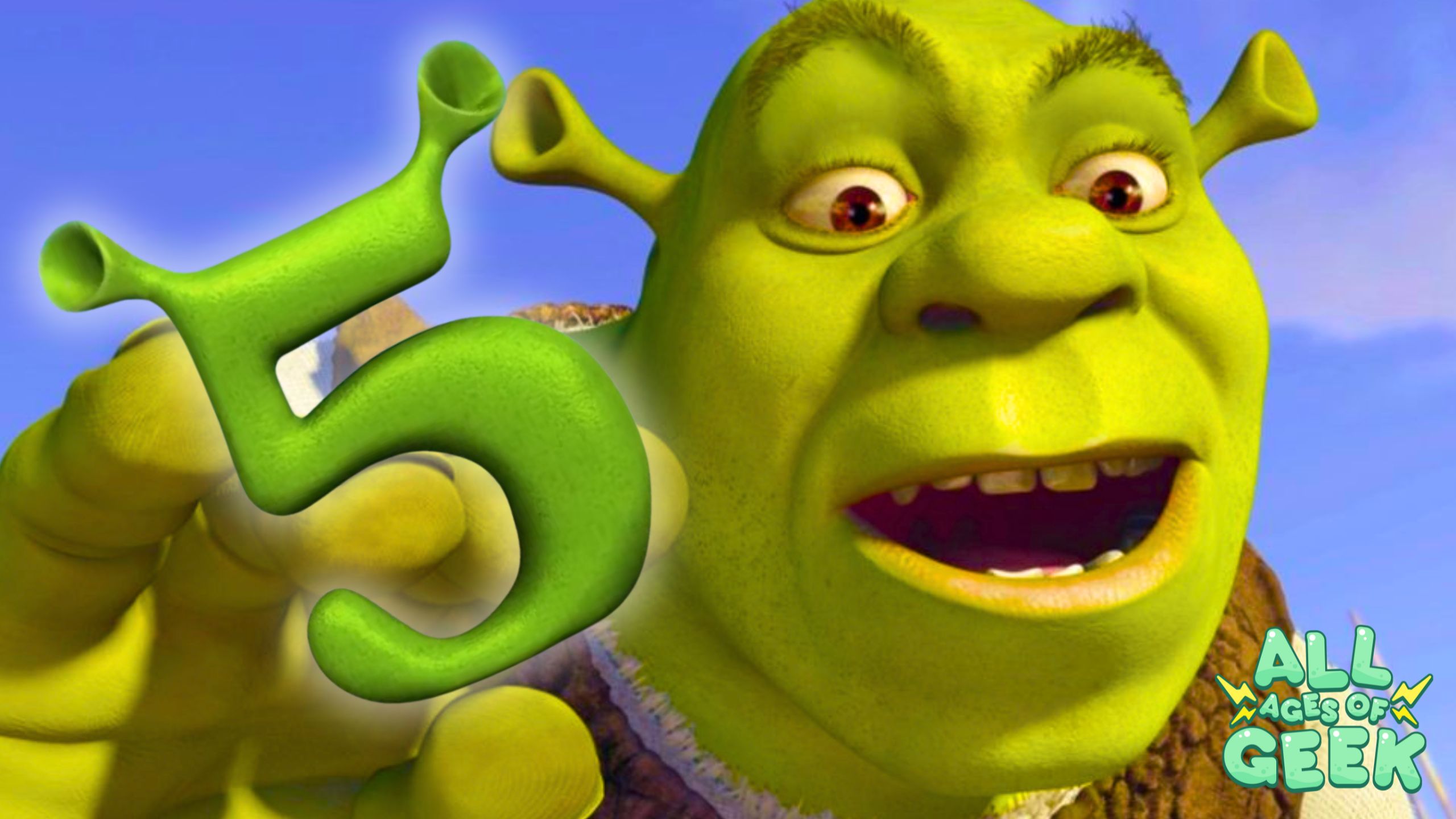 "Shrek holding a large green number 5 with a joyful expression on his face, set against a clear blue sky background. The 'All Ages of Geek' logo is visible in the bottom right corner