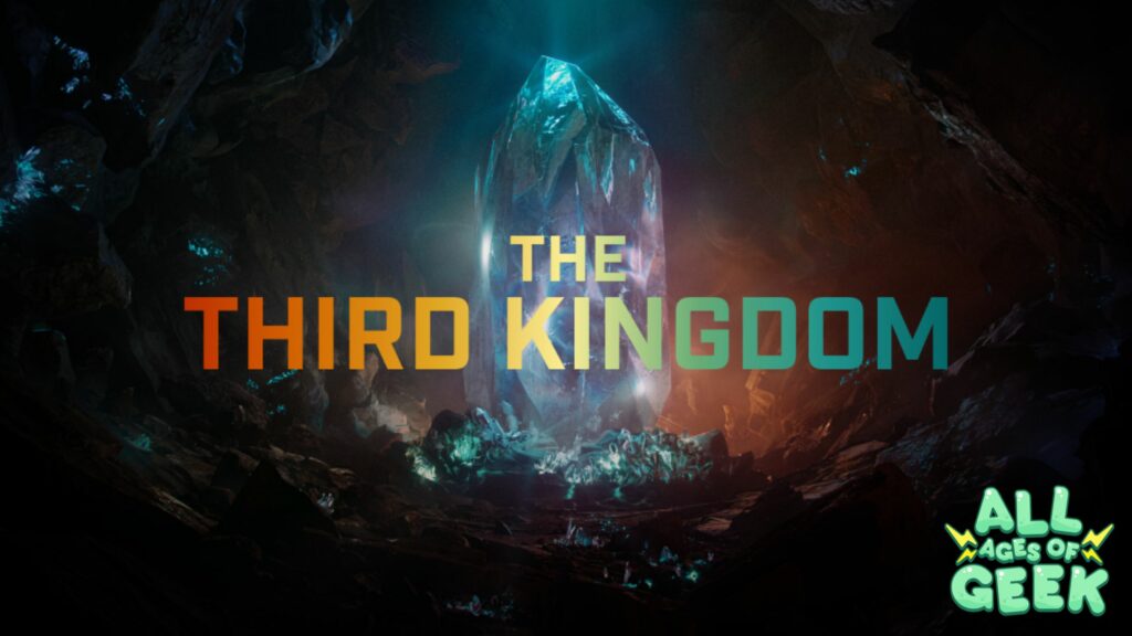 A dark background with a gem in the center radiating an orange glow with the words The Third Kingdom centered.