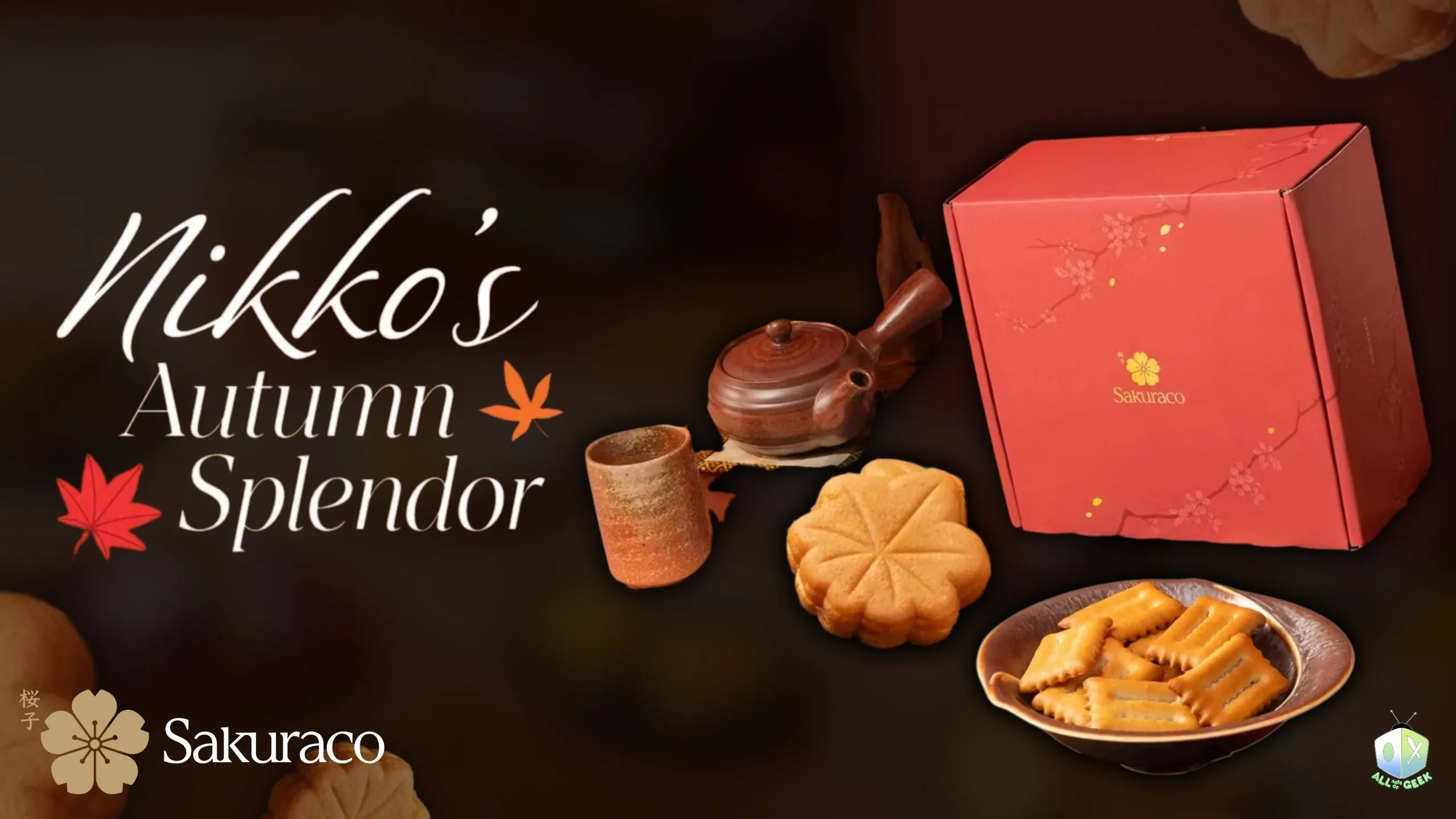 A red Sakuraco box sits beside a traditional Japanese teapot, a rustic tea cup, and autumn-themed snacks including maple leaf-shaped cakes and biscuits. The image features the text "Nikko’s Autumn Splendor" and the Sakuraco logo, representing a seasonal Japanese snack box curated for autumn.