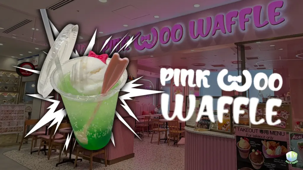 Promotional image for PINK WOO WAFFLE café in Japan featuring a bright green melon soda float topped with ice cream and a cute pink spoon, overlaid on the café’s pastel pink interior and neon signage.