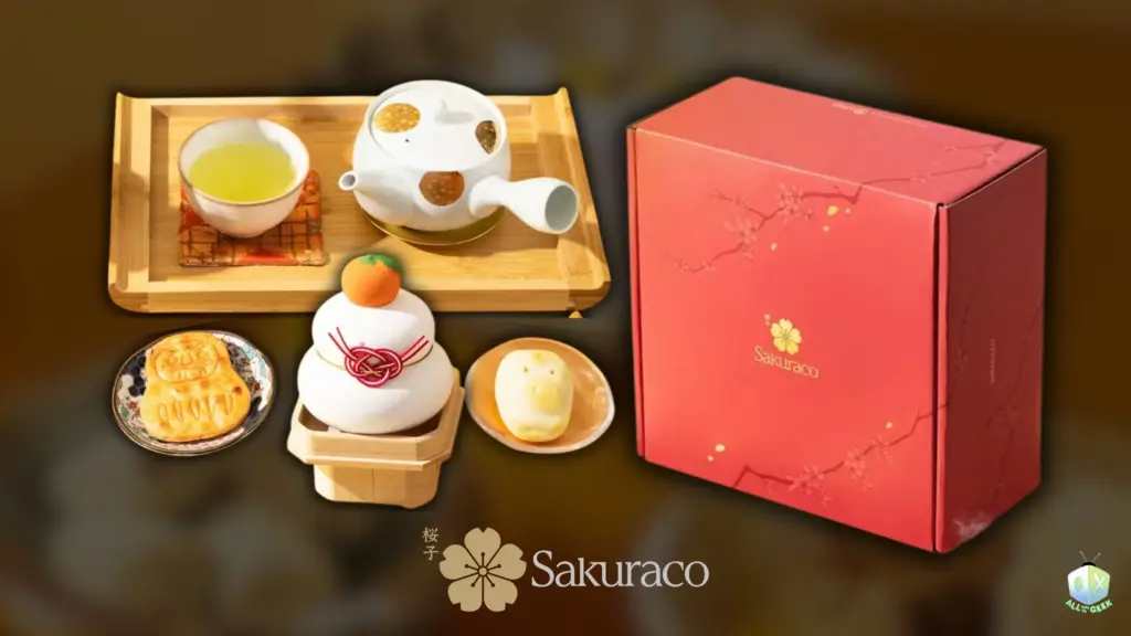 Sakuraco January 2026 Box with traditional Japanese tea set, wagashi sweets, kagami mochi decoration, Daruma senbei, and a red Sakuraco gift box celebrating Oshogatsu and New Year traditions
