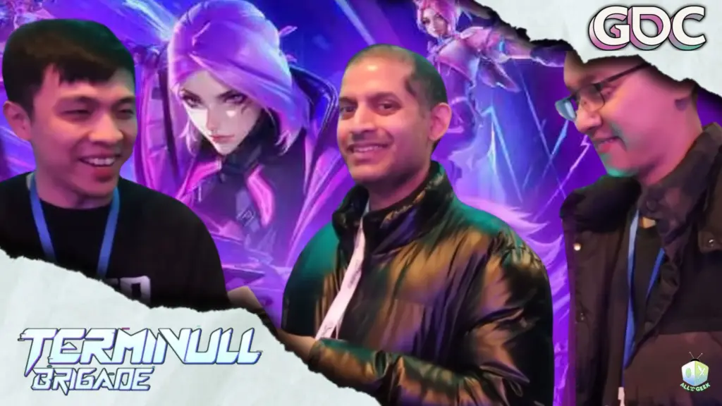 Three people at a gaming event interview setup, smiling and talking while standing in front of a purple, futuristic game-themed backdrop featuring a stylized female character. The image includes torn-paper style framing, the text “Terminull Brigade” at the bottom left, and “GDC” in the top right, with an All Ages of Geek logo in the corner.